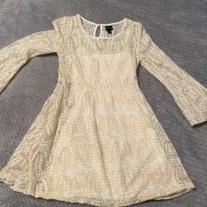Ivory and gold lace dress
￼